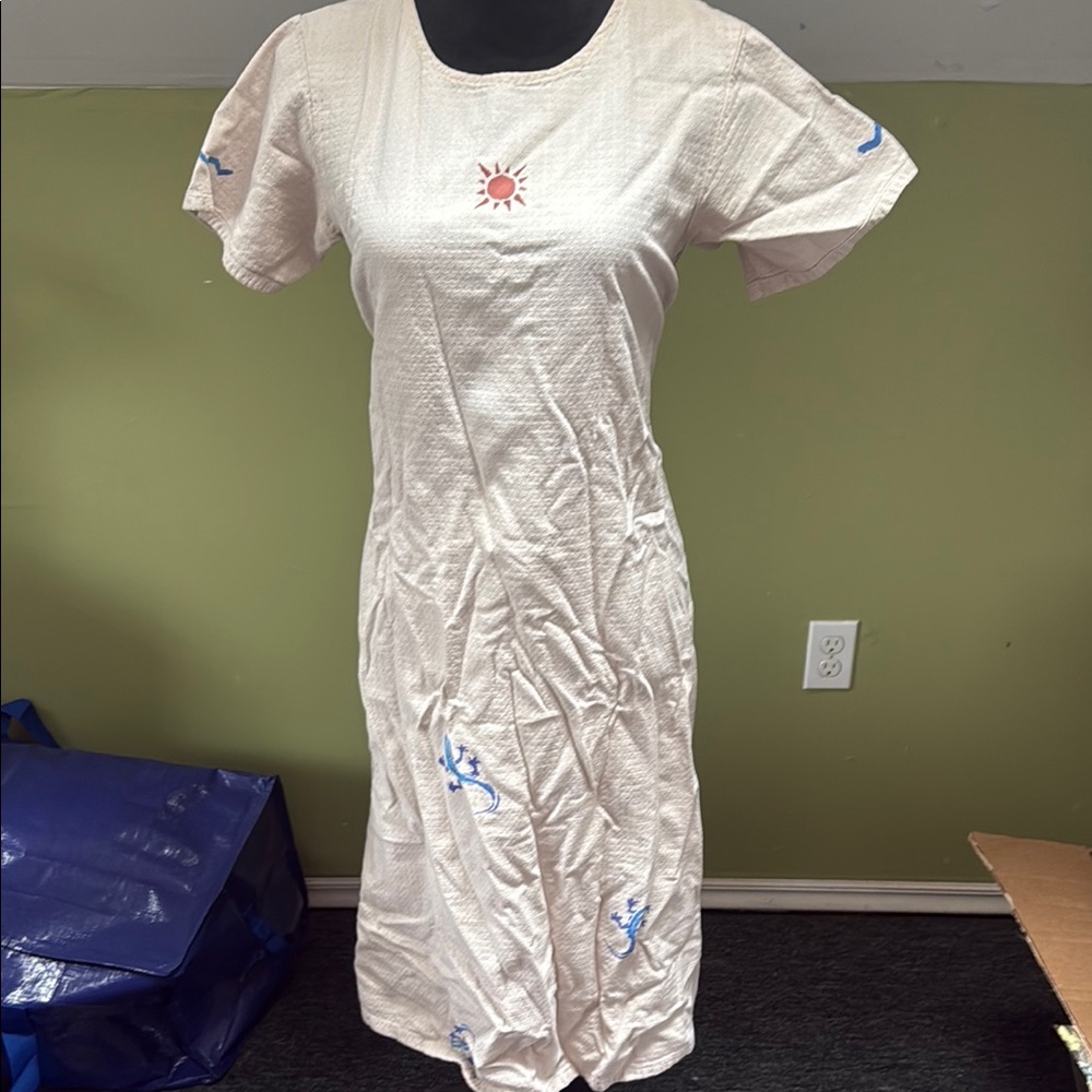 Elegant Cream Dress with Blue Accents